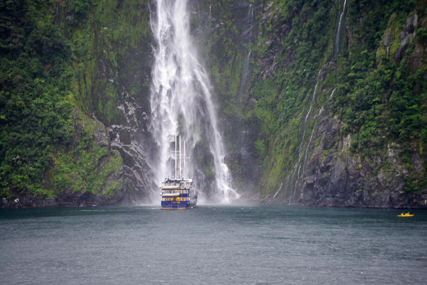 Naked ship takes shower in public! Kayakers manage to escape unharmed.