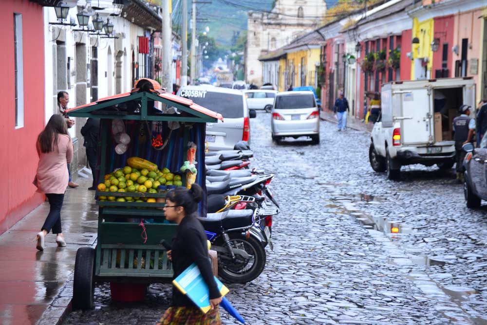 Fruit vendor in the city of Antigua, Guatemala.