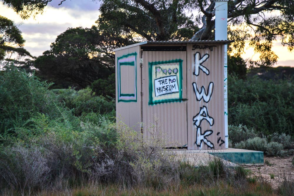 Image of the tin drop hole toilet at the Rockleigh Camp.