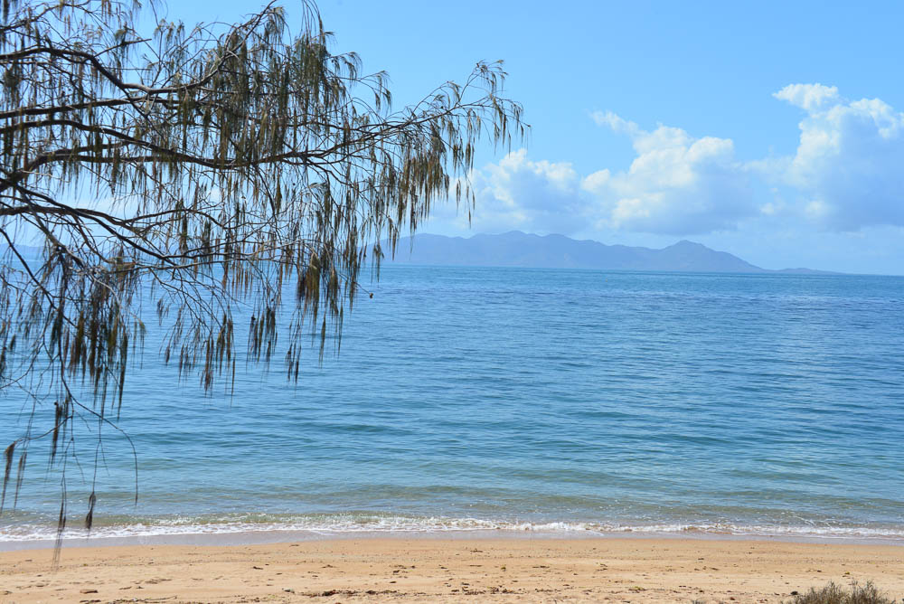 An image of the mainland of queensland from Nelly bay Beach on Magnetic Island