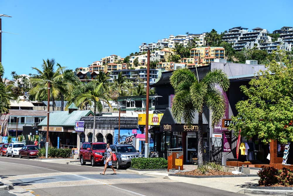 Image of the apartment buildings rising up from the main street in Airlie Beach, North Queensland.